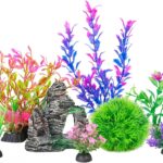 A colorful 8-piece set of Ameliade artificial aquarium plastic plants and a rock cave decoration for fish tanks.