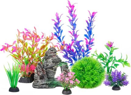A colorful 8-piece set of Ameliade artificial aquarium plastic plants and a rock cave decoration for fish tanks.