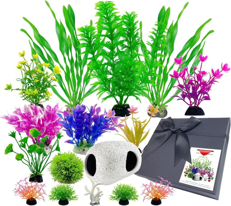 A 16-piece BOYIEENTER aquarium decoration set featuring colorful artificial plastic plants and a smooth fish cave rock.