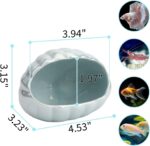 A blue ceramic shell-shaped hideout for an aquarium, designed for betta fish and other small aquatic creatures.