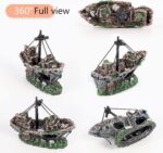 A detailed, multicolor Raeasily shipwreck resin aquarium ornament depicting a sunken vessel amidst aquatic plants, adding cha