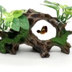 Textured resin artificial driftwood cave with silk plants, suitable for fish tanks and terrariums, offering a naturalistic hi