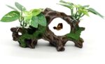 Textured resin artificial driftwood cave with silk plants, suitable for fish tanks and terrariums, offering a naturalistic hi