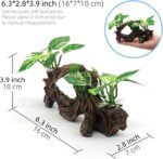 Textured resin artificial driftwood cave with silk plants, suitable for fish tanks and terrariums, offering a naturalistic hi