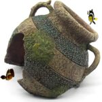 Yellow and green relaqcc Leaning Vase Hideaway Cave aquarium decor, suitable for fish and reptiles.