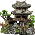 Multicolor resin castle aquarium decoration featuring an Eastern Tower design, providing shelter for fish.