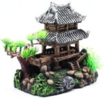 Multicolor resin castle aquarium decoration featuring an Eastern Tower design, providing shelter for fish.