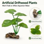 Two UreverFins artificial silk aquarium plants with driftwood bases, realistic green and brown colors, in a fish tank.
