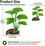 Two UreverFins artificial silk aquarium plants with driftwood bases, realistic green and brown colors, in a fish tank.